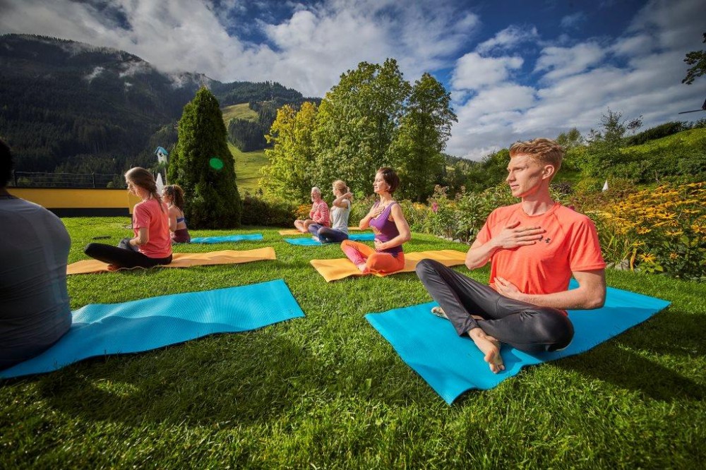 Yoga in the garden of the Hotel Saalbacher Hof